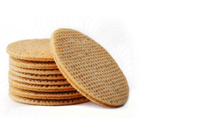 A stack of waffle cookies on a white background. The cookies are all the same size and shape, and they are piled on top of each other. Concept of abundance and indulgence