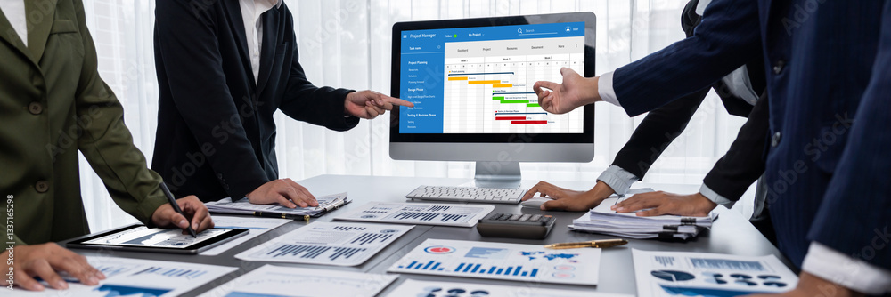 Poster project planning software for brisk business project management on the computer screen showing timel