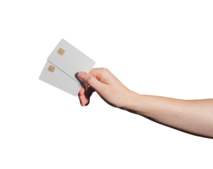 A female hand holding a blank plastic credit card with a chip, promoting cashless payment. Modern banking and financial concept, advertising shopping and payment services. Closeup, with light and gray