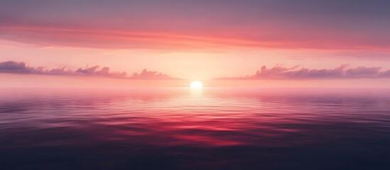 Obraz premium Pink sunset over calm water