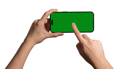 Hand holding a smartphone horizontally with a blank green chromakey screen, index finger tapping the center for interaction. Ideal for video, gaming, and app promotion. Isolated on white background..