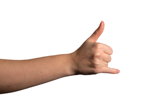 Hand making the shaka sign with pinky little finger extended, symbolizing aloha, surfing. Female expressing a friendly and cool gesture. Isolated on white background..