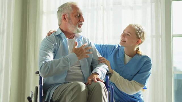 Help support retirement healthcare. Nurse helping old man in wheelchair. Patient and woman in nursing home for medical caregiver. Nurse taking care of paralyzed man in chair for people with disability