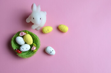 Nest of eggs and Easter bunny. Easter.