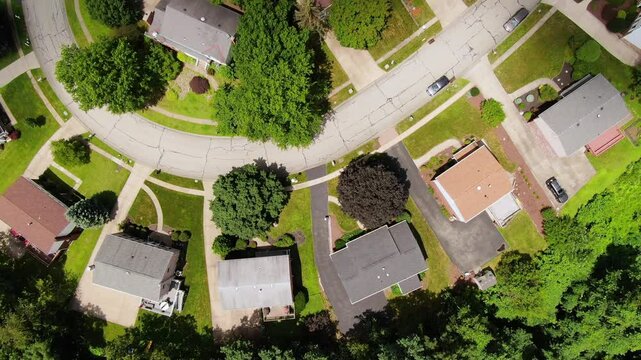 An aerial view looking straight down on a typical middle class Pennsylvania residential neighborhood. Pittsburgh suburbs.  	