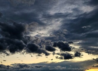 Beautiful sky with clouds background. Sky with clouds weather nature cloud blue. Сloud and sky in the evening. dark clouds in the sky, layers of cloud passing through