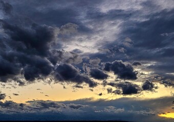 Beautiful sky with clouds background. Sky with clouds weather nature cloud blue. Сloud and sky in the evening. dark clouds in the sky, layers of cloud passing through