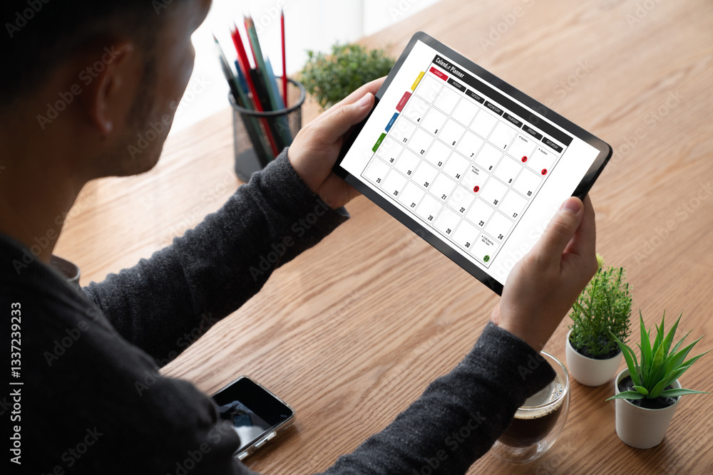 Poster calendar on computer software application for modish schedule planning for personal organizer and on