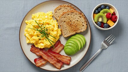 Breakfast Plate with Scrambled Eggs and Fresh Fruit