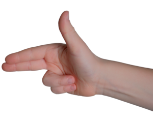 Gesture of playfulness captured in a hand forming a finger gun