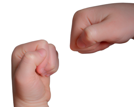 Two hands about to engage in a playful fist bump moment - Powered by Adobe