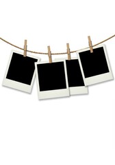 Blank Instant Photos Hanging on a Rope - Four blank instant photos hang from a clothesline, symbolizing memories, potential, nostalgia, simplicity, and preservation