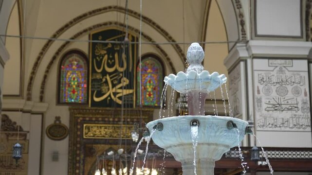 water flowing from mosque fountain