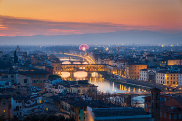 Florence, Italy - skyline view from Piazzale Michelangelo over Arno river with Ponte Vecchio at night