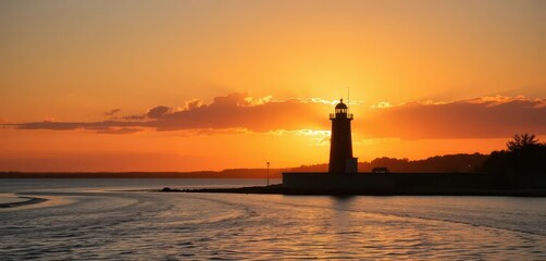 Golden hour sun sets behind a lakeside lighthouse, casting long shadows, light, lighthouse