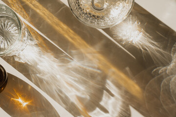 Obraz premium Crystal and Amber Glass Reflections in Warm Neutral Tones, Abstract Shadow Play