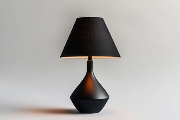 A detailed depiction of a black table lamp with a matte finish and conical shade exuding classic design and timeless elegance for versatile decor