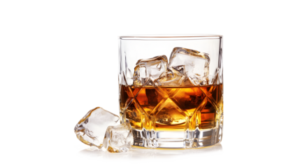 A glass of liquor with ice cubes in it. The ice cubes are scattered around the glass, and the glass is almost full. Concept of relaxation and enjoyment, as the ice cubes suggest a cool