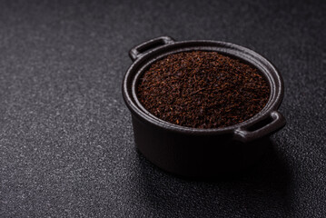 Black tea dry crushed in bowl