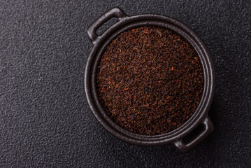 Black tea dry crushed in bowl