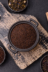 Black tea dry crushed in bowl