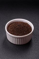 Black tea dry crushed in bowl