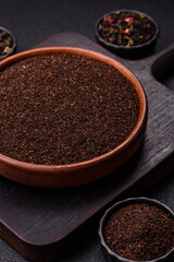 Black tea dry crushed in bowl