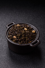 Dry green tea with soursop piece, knapweed petals in bowl