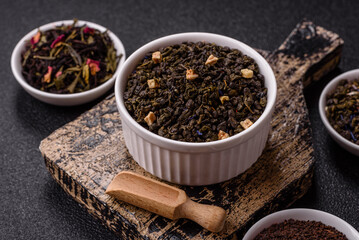 Dry green tea with soursop piece, knapweed petals in bowl