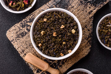 Dry green tea with soursop piece, knapweed petals in bowl