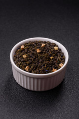 Dry green tea with soursop piece, knapweed petals in bowl