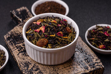 Dry tea mix blend black, green and flower petals in bowl