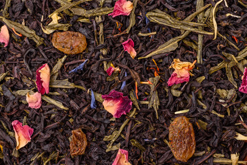 Dry tea mix blend black, green and flower petals in bowl