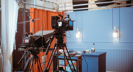 Film set, monitors and modern shooting equipment. Film crew, lighting devices, monitors, playbacks - filming equipment and a team of specialists in filming movies, advertising and TV series