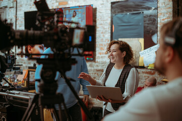 Film set, monitors and modern shooting equipment. Film crew, lighting devices, monitors, playbacks - filming equipment and a team of specialists in filming movies, advertising and TV series
