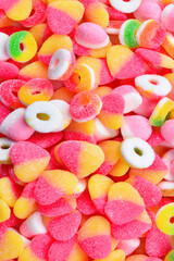 Assorted gummy candies. Top view.