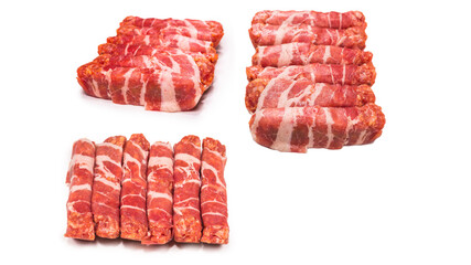 Chevapchichi in bacon isolated on white background.