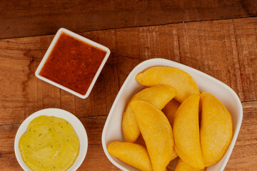 Delicious traditional Colombian empanadas with spicy sauce