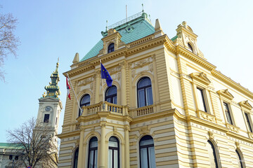 Beautiful historical buildings in Belgrade: view of the Orthodox Cathedral in Baroque style and the Krsmanovica House built in the spirit of academicism. Architecture in the capital of Serbia.