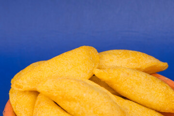 Delicious traditional Colombian empanadas with spicy sauce