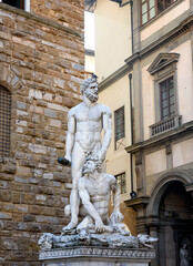 Statues of Hercules, Cacus in front of Florence Palazzo Vecchio in Piazza della Signoria in Florence, Italy. Architecture and landmark of Florence, postcard of Florence.
