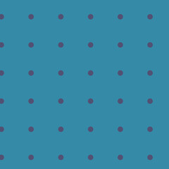Blue background with purple dots in a repetitive pattern creating a playful and vibrant design