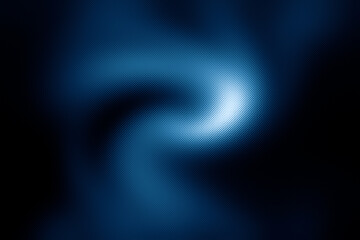 Abstract blue swirl in a dark background with dotted texture