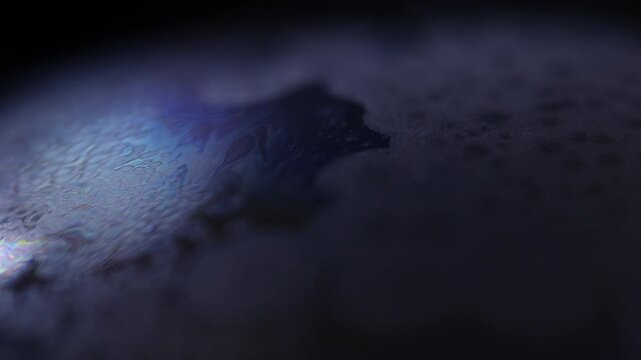 Real-time crystal growth on liquid surface, unique physical phenomenon. Freezing of water in macro. Salt crystal growth, beautiful experiment. Ice crystals