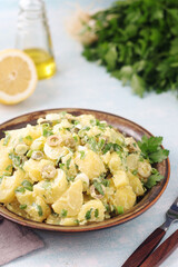 A bowl with Greek potato salads