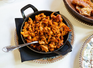 Image of fry pan with fried beef with chorizo, nobody
