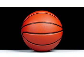 Obraz premium Leather basketball, perfectly centered against a stark black background, isolated, high-resolution