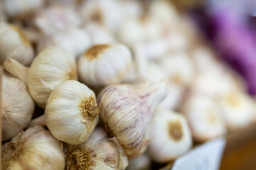 Garlic closeup in basket on a market counter