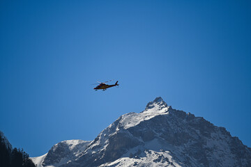 The ambulance helicopter is transporting patients.