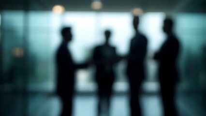 Silhouetted Figures in Business Meeting